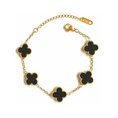 Gold chain bracelet with five black four-leaf clover charms, elegant jewelry