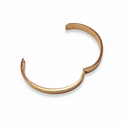 Gold anti-tarnish cuff bracelet for women and men on white background