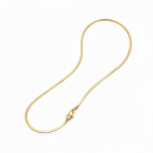 Gold herringbone chain necklace with lobster clasp on white background