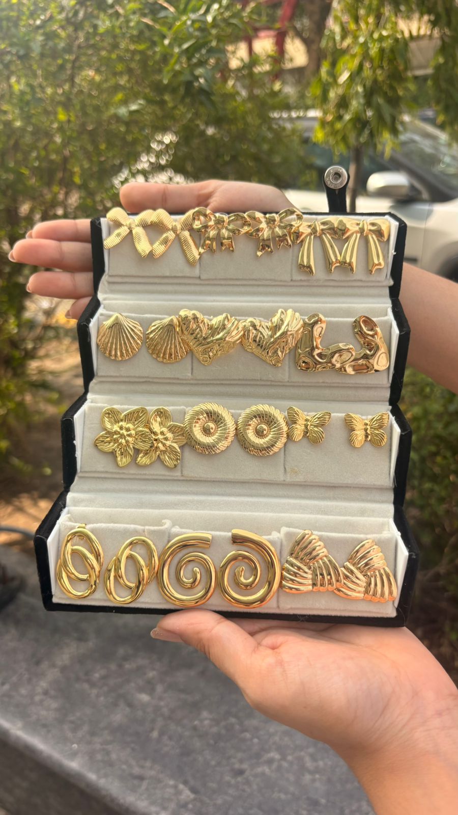 12 Pair of Gold Earrings